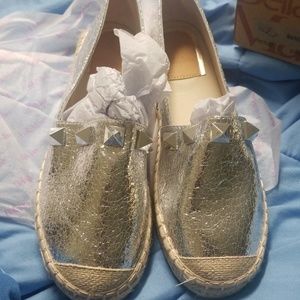 Silver shoes with silver studs